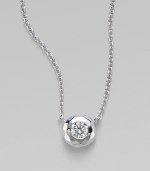 From the Silver Rain Collection. A fiery, faceted diamond is bezel set in sterling silver, adding extraordinary sparkle to a box chain.Diamond, .17 tcw Sterling silver About 18 Lobster clasp closure Imported