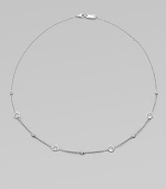 From the Silver Rain Collection. Delicate diamonds and faceted clear quartz are equally radiant within setttings of hammered sterling silver on a graceful chain.Diamonds, .20 tcw Clear quartzSterling silverLength, about 18Lobster claspImported