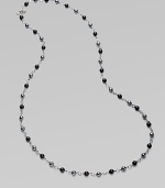 From the Bijoux Collection. A long elegant sterling silver strand of black onyx and hematite beads.Black onyx, hematite Sterling silver Length, about 40 Toggle closure Imported