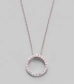 From the Tiny Treasures Collection. A simple circle shimmers and sparkles, outlined in diamonds and dangling from a chain of 18k white gold. Diamonds, 0.10 tcw 18k white gold Chain length, about 16 Pendant diameter, about ½ Lobster clasp Made in Italy