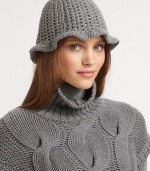 A slightly ruffled brim elevates this soft, hand-crocheted design.70% wool/30% cashmereDry cleanMade in Switzerland