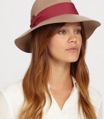 Remain warm and stylish this season with this floppy fedora style trimmed with pleated cotton band and feather detail for a timeless finish.WoolOne size fits mostSpot cleanImported