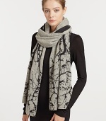 An ultra-soft, ultra-luxe cashmere design is adorned with a large tree print.Cashmere24 X 74Dry cleanImported