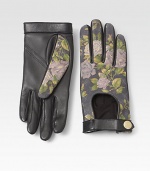 A beautiful floral design completes this biker meets babe design of ultra-soft lambskin leather.Snap-button closureLength, about 8.5LeatherDry cleanImported