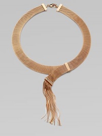 Striking in its simplicity, a flat strand of golden mesh with a glowing rose gold finish ends in a cascade of delicate fringe with Swarovski crystal accents.Crystal Rose goldplatedNecklace length, about 15¾Fringe length, about 4Lobster claspMade in Italy Striking in its simplicity, a flat strand of golden mesh with a glowing rose gold finish ends in a cascade of delicate fringe with Swarovski crystal accents.Crystal Rose goldplatedNecklace length, about 15¾Fringe length, about 4Lobster claspMade in Italy