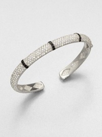 From the Soho Collection. Five rows of dazzling white sapphires accented with rich black spinels set in sterling silver.Black spinel and white sapphireSterling silverDiameter, about 2.75Hinged closureImported From the Soho Collection. Five rows of dazzling white sapphires accented with rich black spinels set in sterling silver.Black spinel and white sapphireSterling silverDiameter, about 2.75Hinged closureImported