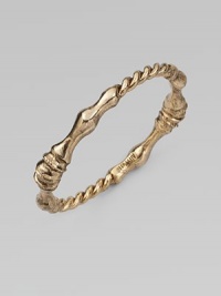 A truly unique design of connecting horse hooves and twisted rope, all in an antiqued-finish. GoldtoneDiameter, about 3½Slip-on styleMade in USA A truly unique design of connecting horse hooves and twisted rope, all in an antiqued-finish. GoldtoneDiameter, about 3½Slip-on styleMade in USA