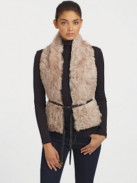 The perfect accent piece, this dyed curly lamb design comes with a leather tie belt for added interest. Leather tie beltSpecialist dry cleanImportedFur origin: China The perfect accent piece, this dyed curly lamb design comes with a leather tie belt for added interest. Leather tie beltSpecialist dry cleanImportedFur origin: China