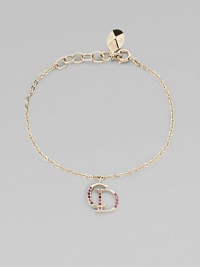 Dazzling, crystal encrusted logo charm on link chain for an iconic design. GoldtoneCrystalsLength, about 6Spring ring closureImported Dazzling, crystal encrusted logo charm on link chain for an iconic design. GoldtoneCrystalsLength, about 6Spring ring closureImported