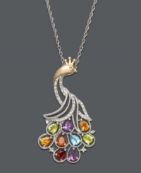 Capture all the colors of the rainbow with this majestic peacock pendant. A swirling 14k gold and sterling silver setting highlights sparkling round-cut diamonds (1/8 ct. t.w.) and cascading pear-cut gemstones, including blue topaz (1/5 ct. t.w.), citrine (1/4 ct. t.w.), madeira citrine (1/8 ct. t.w.), garnet (1/5 ct. t.w.), amethyst (1/4 ct. t.w.) and peridot (1/3 ct. t.w.). Approximate length: 18 inches. Approximate drop: 1-1/2 inches. Capture all the colors of the rainbow with this majestic peacock pendant. A swirling 14k gold and sterling silver setting highlights sparkling round-cut diamonds (1/8 ct. t.w.) and cascading pear-cut gemstones, including blue topaz (1/5 ct. t.w.), citrine (1/4 ct. t.w.), madeira citrine (1/8 ct. t.w.), garnet (1/5 ct. t.w.), amethyst (1/4 ct. t.w.) and peridot (1/3 ct. t.w.). Approximate length: 18 inches. Approximate drop: 1-1/2 inches.