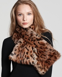 Make a fierce fur statement in Adrienne Landau's leopard-print neckwarmer, lined in a soft wool-cashmere blend. Make a fierce fur statement in Adrienne Landau's leopard-print neckwarmer, lined in a soft wool-cashmere blend.