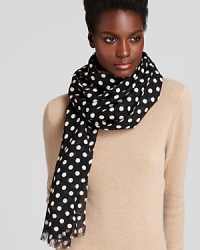 With all-over white polka dots, this kate spade new york scarf ties together fresh, sophisticated style. With all-over white polka dots, this kate spade new york scarf ties together fresh, sophisticated style.