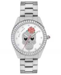 Death by fashion. This Betsey Johnson watch features a skull graphic with shimmering crystal accents. Death by fashion. This Betsey Johnson watch features a skull graphic with shimmering crystal accents.