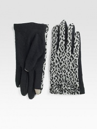 Ultra-soft, ultra-toasty wool and angora blend in a fashionable cheetah print with touch technology for easy access to touchscreen electronics.About 8 long60% wool/20% angora/20% nylonDry cleanImported Ultra-soft, ultra-toasty wool and angora blend in a fashionable cheetah print with touch technology for easy access to touchscreen electronics.About 8 long60% wool/20% angora/20% nylonDry cleanImported