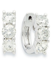 Add a little luxury to your look. These 14k white gold hoop earrings shine with the addition of three round-cut diamond stations (1-1/2 ct. t.w.). Approximate diameter: 15 mm. Add a little luxury to your look. These 14k white gold hoop earrings shine with the addition of three round-cut diamond stations (1-1/2 ct. t.w.). Approximate diameter: 15 mm.