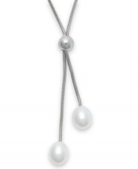 Three cultured freshwater pearls (9 mm) add shimmer to this lovely lariat-style necklace. Set in sterling silver. Approximate length: 19-1/2 inches. Approximate drop: 1-1/2 inches. Three cultured freshwater pearls (9 mm) add shimmer to this lovely lariat-style necklace. Set in sterling silver. Approximate length: 19-1/2 inches. Approximate drop: 1-1/2 inches.