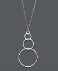 Light and airy, this subtle style perfects any look. Studio Silver's pretty pendant features three graduated, interlocking rings in sterling silver. Approximate length: 16 inches. Approximate drop: 1-3/4 inches. Light and airy, this subtle style perfects any look. Studio Silver's pretty pendant features three graduated, interlocking rings in sterling silver. Approximate length: 16 inches. Approximate drop: 1-3/4 inches.
