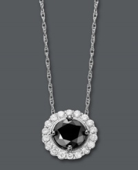 Sparkle that makes a statement. A round-cut black diamond (1/3 ct. t.w.) stands out against a ring of round-cut white diamonds (1-5/8 ct. t.w.). Setting and rope chain crafted in 14k white gold. Approximate length: 18 inches Approximate drop: 3/8 inch. Sparkle that makes a statement. A round-cut black diamond (1/3 ct. t.w.) stands out against a ring of round-cut white diamonds (1-5/8 ct. t.w.). Setting and rope chain crafted in 14k white gold. Approximate length: 18 inches Approximate drop: 3/8 inch.