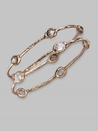 Five faceted ovals of softly colored smokey quartz sit within a hammered bangle of 18k gold and sterling silver with a glowing finish of 18k rose goldplating. Smoky quartz An alloy of 18K gold and sterling silver plated with 18K rose gold Diameter, about 2¾ Imported Please note: Bracelets sold separately. Five faceted ovals of softly colored smokey quartz sit within a hammered bangle of 18k gold and sterling silver with a glowing finish of 18k rose goldplating. Smoky quartz An alloy of 18K gold and sterling silver plated with 18K rose gold Diameter, about 2¾ Imported Please note: Bracelets sold separately.