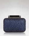 A shining example of evening style. This boxy, DIANE von FURSTENBERG clutch puts on the glitz with a smattering of crystals.