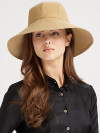 Practical water-repellent design with adjustable buckle tab in back. Nylon interlining maintains shape Polyester Imported Practical water-repellent design with adjustable buckle tab in back. Nylon interlining maintains shape Polyester Imported