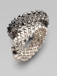 Fabulously crafted bangle of blackened sterling silver displays a sculptural stud pattern with one contrasting stud at the clasp. Sterling silver Diameter, about 2½ Width, about ¾ Hinged with clasp Imported Please note: Bracelets sold separately. Fabulously crafted bangle of blackened sterling silver displays a sculptural stud pattern with one contrasting stud at the clasp. Sterling silver Diameter, about 2½ Width, about ¾ Hinged with clasp Imported Please note: Bracelets sold separately.
