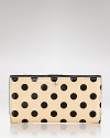 Upgrade your everyday wallet to this kate spade new york design. A shining on-duty choice crafted of patent leather, its snap closure opens to an interior that will keep you organized in style.