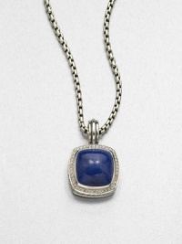 From the Albion Collection. A lapis cabochon set in sterling silver accented with brilliant diamonds on a bale. LapisDiamonds, .48 tcwSterling silverSize, about .66ImportedPlease note: Chain sold separately. From the Albion Collection. A lapis cabochon set in sterling silver accented with brilliant diamonds on a bale. LapisDiamonds, .48 tcwSterling silverSize, about .66ImportedPlease note: Chain sold separately.