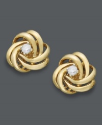 Symbolic sparkle. These sweet stud earrings by Wrapped in Love™ feature an everlasting knot design with a central, round-cut diamond (1/10 ct. t.w.). Set in 14k gold. Approximate diameter: 4/10 inch. Symbolic sparkle. These sweet stud earrings by Wrapped in Love™ feature an everlasting knot design with a central, round-cut diamond (1/10 ct. t.w.). Set in 14k gold. Approximate diameter: 4/10 inch.