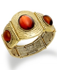 Add glam in an instant with Style&co.'s stretch bracelet. The antiqued design is embellished with smoky topaz glass cabochon accents. Bracelet stretches to fit wrist. Crafted in antiqued gold tone mixed metal. Approximate diameter: 2-1/4 inches. Add glam in an instant with Style&co.'s stretch bracelet. The antiqued design is embellished with smoky topaz glass cabochon accents. Bracelet stretches to fit wrist. Crafted in antiqued gold tone mixed metal. Approximate diameter: 2-1/4 inches.
