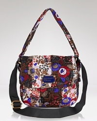 Decorate every look with this printed floral bag from MARC BY MARC JACOBS. The simple silhouette exudes a casual elegance but it's the wallpaper pattern that really punches things up. Decorate every look with this printed floral bag from MARC BY MARC JACOBS. The simple silhouette exudes a casual elegance but it's the wallpaper pattern that really punches things up.