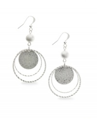 Let perfect rings frame your face. These shimmery orbital drop earrings by Style&co. feature a unique sandblasted design and beaded accents. Crafted in silver tone mixed metal. Approximate drop: 2-1/2 inches. Let perfect rings frame your face. These shimmery orbital drop earrings by Style&co. feature a unique sandblasted design and beaded accents. Crafted in silver tone mixed metal. Approximate drop: 2-1/2 inches.