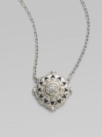 From the Windsor Collection. A lacy medallion combining graphic shapes, delicate granulation and the sparkle of white sapphires hangs from a graceful chain of textured links. White sapphires Sterling silver and 18k yellow gold Chain length, about 17 Pendant diameter, about 1 Lobster clasp Imported