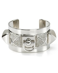 Rock a heavy metal: this Juicy Couture cuff works an edgy vibe, cast in plated metal with chunky stone accents. Rock a heavy metal: this Juicy Couture cuff works an edgy vibe, cast in plated metal with chunky stone accents.