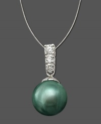 The epitomy of elegance. A smooth cultured Tahitian black pearl (9-10 mm) sits in a 14k white gold setting featuring a row of three sparkling round-cut diamonds (1/10 ct. t.w.). Approximate length: 18 inches. Approximate drop: 3/4 inch. The epitomy of elegance. A smooth cultured Tahitian black pearl (9-10 mm) sits in a 14k white gold setting featuring a row of three sparkling round-cut diamonds (1/10 ct. t.w.). Approximate length: 18 inches. Approximate drop: 3/4 inch.