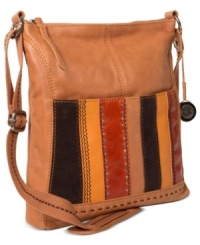 Snakeskin trim - on the shoulder pad, around the metallic front zip pocket - stylishly accents this perfectly sized crossbody bag from The Sak. Snakeskin trim - on the shoulder pad, around the metallic front zip pocket - stylishly accents this perfectly sized crossbody bag from The Sak.