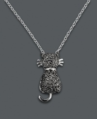 Stir up a feline frenzy in this standout style. Victoria Townsend's cute cat pendant features sparkling black diamond accents and a sterling silver setting. Approximate length: 18 inches. Approximate drop: 3/4 inch. Stir up a feline frenzy in this standout style. Victoria Townsend's cute cat pendant features sparkling black diamond accents and a sterling silver setting. Approximate length: 18 inches. Approximate drop: 3/4 inch.