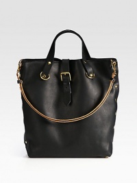A modern and avant-garde brand with beautifully-crafted pieces such as this luxurious leather design with edgy rivets in a sleek and minimalist style.Top handles, 6¼ dropDetachable adjustable shoulder strap, 12¼-20¾Magnetic snap strap closureInside pocketsFully lined14½W X 13H X 6DMade in Italy A modern and avant-garde brand with beautifully-crafted pieces such as this luxurious leather design with edgy rivets in a sleek and minimalist style.Top handles, 6¼ dropDetachable adjustable shoulder strap, 12¼-20¾Magnetic snap strap closureInside pocketsFully lined14½W X 13H X 6DMade in Italy