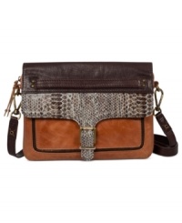 Keep up with the cool crowd with this petite powerhouse that packs an edgy urban attitude into an easygoing style. Richly trimmed and sized-right for day or night, it's the ultimate trend-right takeaway. From The Sak. Keep up with the cool crowd with this petite powerhouse that packs an edgy urban attitude into an easygoing style. Richly trimmed and sized-right for day or night, it's the ultimate trend-right takeaway. From The Sak.
