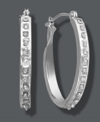 It's your time to shine. Stunning oval-shaped hoop earrings get an extra glamorous touch with the addition of sparkling diamond accents. Crafted in 14k white gold. Approximate diameter: 3/4 inch x 1/2 inch. It's your time to shine. Stunning oval-shaped hoop earrings get an extra glamorous touch with the addition of sparkling diamond accents. Crafted in 14k white gold. Approximate diameter: 3/4 inch x 1/2 inch.