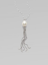 A baroque pearl with a sterling silver tassel on a sterling silver chain. 16mm baroque white organic man-made pearl Length, about 36 Sterling silver Lobster clasp closure Imported 