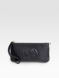 Soho leather wristlet with zip closure.LeatherLight fine gold hardwareEmbossed interlocking G detailTop zip closure with coordinating leather pull8.9W x 4.7H x .6DMade in Italy Soho leather wristlet with zip closure.LeatherLight fine gold hardwareEmbossed interlocking G detailTop zip closure with coordinating leather pull8.9W x 4.7H x .6DMade in Italy
