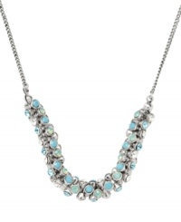 Spark a conversation in Fossil's glamorous Glitz necklace. Features sparkling blue and clear crystals strung from a ball shot chain with a lobster claw closure. Set in silver tone mixed metal. Approximate length: 18 inches + 2-inch extender. Spark a conversation in Fossil's glamorous Glitz necklace. Features sparkling blue and clear crystals strung from a ball shot chain with a lobster claw closure. Set in silver tone mixed metal. Approximate length: 18 inches + 2-inch extender.