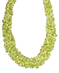 Add a layer of earthy green hues to your neckline. This vivid necklace features layers of peridot gemstone chips (4-6 mm) and a 14k gold toggle clasp. Approximate length: 20 inches. Add a layer of earthy green hues to your neckline. This vivid necklace features layers of peridot gemstone chips (4-6 mm) and a 14k gold toggle clasp. Approximate length: 20 inches.