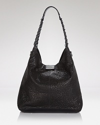 Olivia Harris crafts the quintessential hobo in buttery soft leather with a wide braided strap. Olivia Harris crafts the quintessential hobo in buttery soft leather with a wide braided strap.