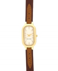 Classic style you can trust, by Nine West. Crafted of brown leather strap and oval gold tone mixed metal case. Champagne dial features gold tone applied stick indices, gold tone hour and minute hands, sweeping second hand and logo at six o'clock. Quartz movement. Limited lifetime warranty. Classic style you can trust, by Nine West. Crafted of brown leather strap and oval gold tone mixed metal case. Champagne dial features gold tone applied stick indices, gold tone hour and minute hands, sweeping second hand and logo at six o'clock. Quartz movement. Limited lifetime warranty.