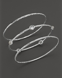 A trio of glimmering bangles makes the perfect gift set. Includes two solid bangles and one jeweled. From Ippolita. A trio of glimmering bangles makes the perfect gift set. Includes two solid bangles and one jeweled. From Ippolita.