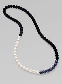 From the Night Blue Collection. This high contrast piece features a strand of flocked velvet beads accented with white and black pearlized glass beads. Length, about 34½ Slip-on style Imported From the Night Blue Collection. This high contrast piece features a strand of flocked velvet beads accented with white and black pearlized glass beads. Length, about 34½ Slip-on style Imported