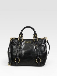 Vitello calfskin top-handle design, perfectly sized for all your essentials.Double top handles, 5 dropDetachable adjustable shoulder strap, 19½-21¾ dropTop zip closureMetal letter logo detailProtective metal feetOne inside zip pocketOne inside open pocketCotton/satin lining11¼W X 9H X 6¾DMade in Italy Vitello calfskin top-handle design, perfectly sized for all your essentials.Double top handles, 5 dropDetachable adjustable shoulder strap, 19½-21¾ dropTop zip closureMetal letter logo detailProtective metal feetOne inside zip pocketOne inside open pocketCotton/satin lining11¼W X 9H X 6¾DMade in Italy