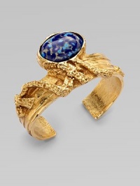 Held in an intriguing freeform setting, a stone of colorfully dotted glass is suspended above your wrist. GlassTextured goldtoneSmall diameter, about 2.16Medium diameter, about 2.28Large diameter, about 2.48Slip-on styleMade in Italy Held in an intriguing freeform setting, a stone of colorfully dotted glass is suspended above your wrist. GlassTextured goldtoneSmall diameter, about 2.16Medium diameter, about 2.28Large diameter, about 2.48Slip-on styleMade in Italy